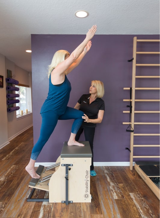 Physical therapist guiding a patient through a one-on-one session